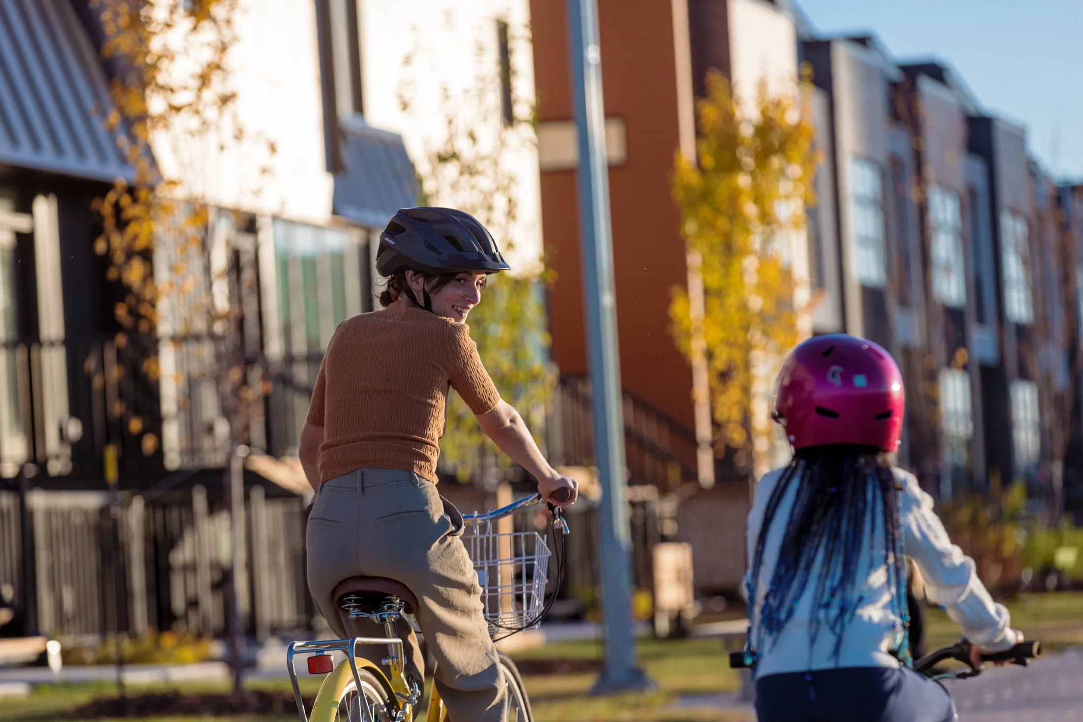 Mother and daughter riding bicycles