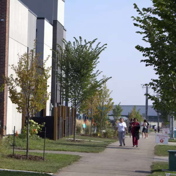 Event-goers stroll neighbourhood