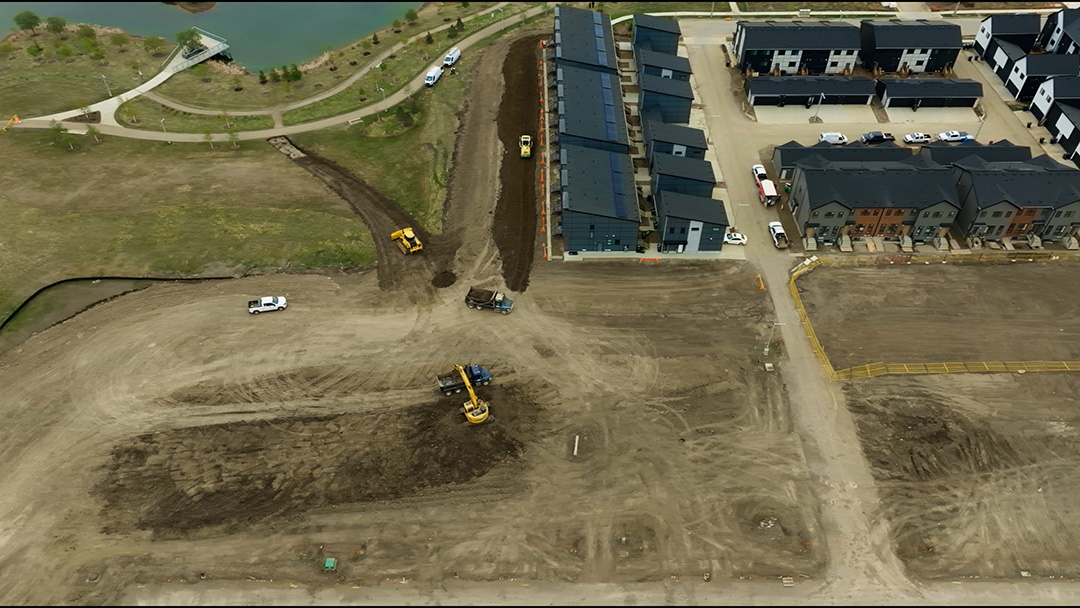 Linear park construction at pond