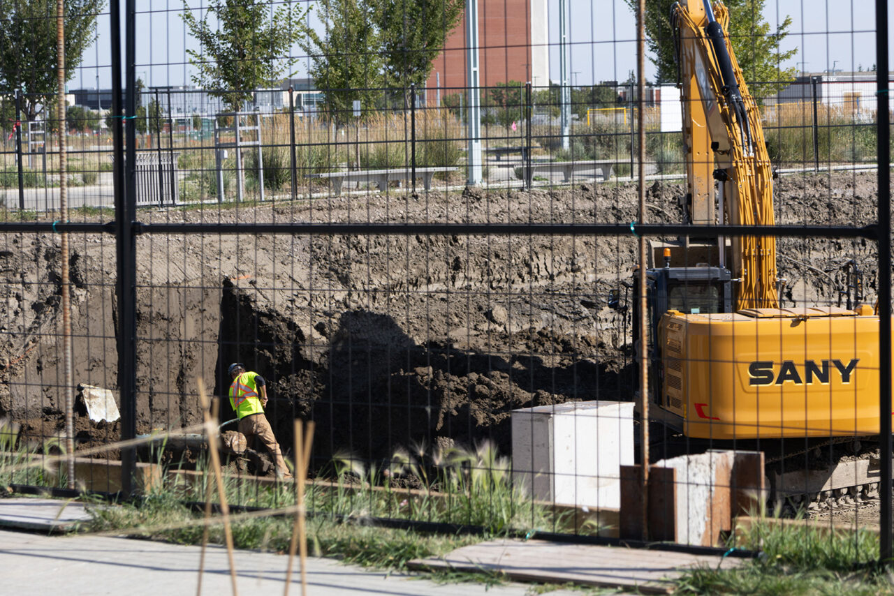 Construction worker in pit